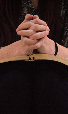 Photograph of praying hands